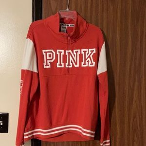 Pink red and white sweater